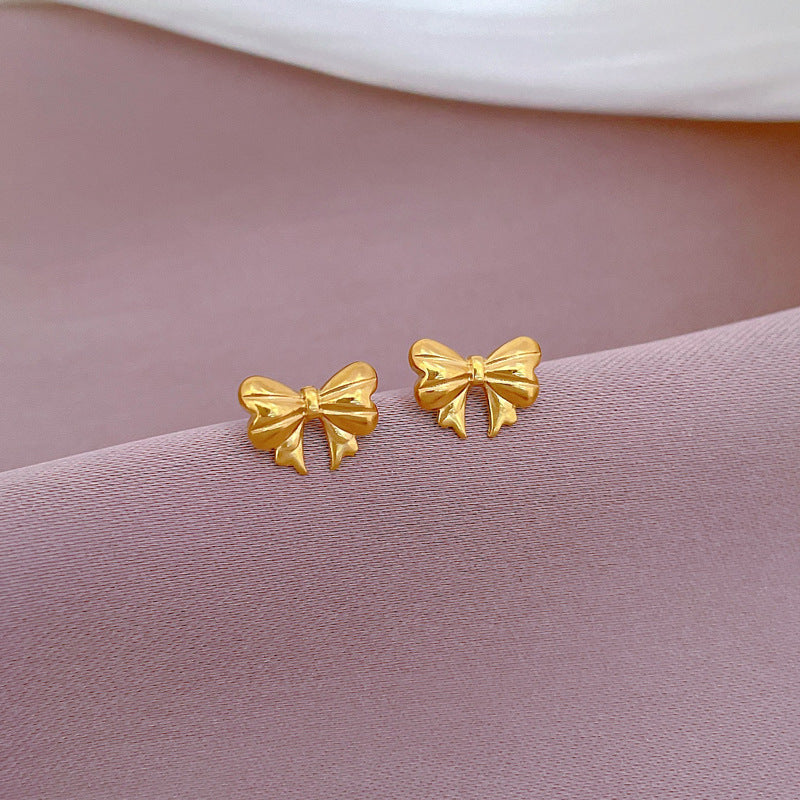 Minimalist Bowknot-Shaped Titanium Steel Stud Earrings with Plated Finish for Women