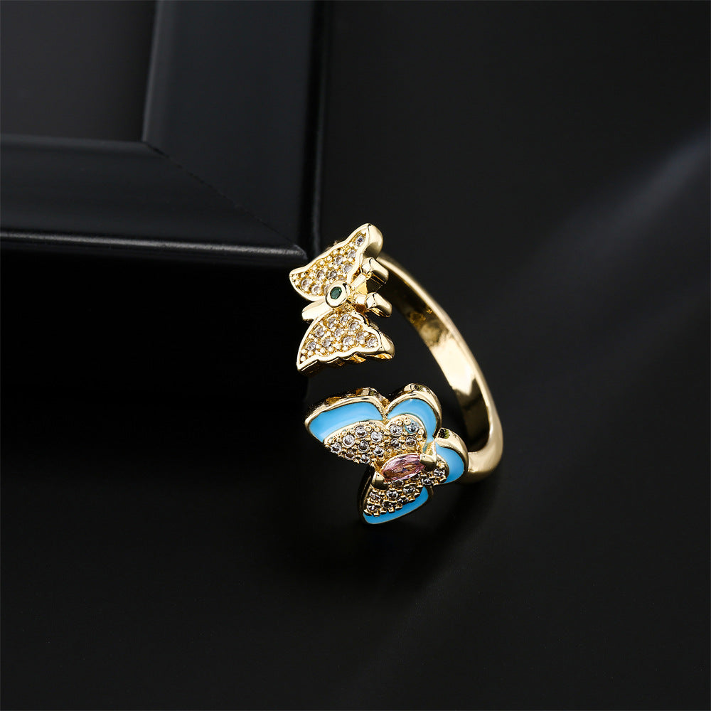 Anello a farfalla aperto stile naturale in rame placcato oro 18K con zirconi micro-incastonati