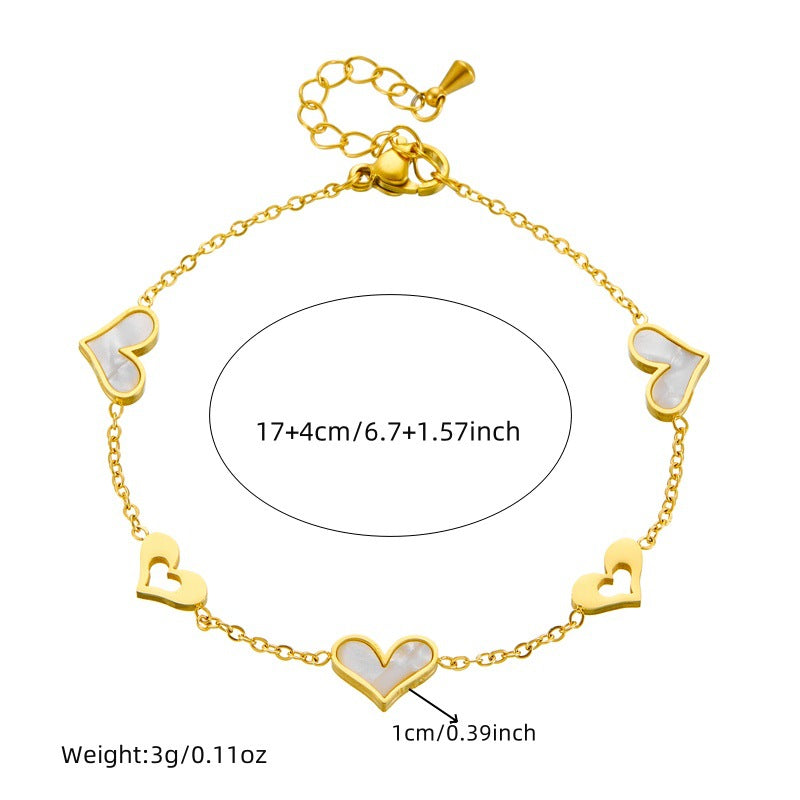 Pulsera de acero inoxidable bañada en oro con colgante de corazón hueco, estilo coreano minimalista, para mujer, para uso diario y como regalo de recuerdo de viaje