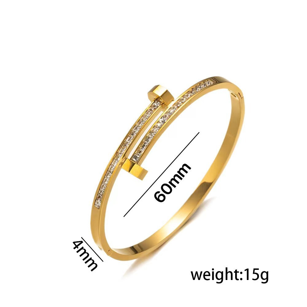 Bracciale minimalista geometrico in acciaio al titanio con zirconi micro-pavé da donna