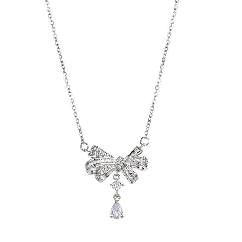 Sweet and Edgy Bow-Shaped Titanium Steel Necklace with Rhinestone Inlay for Women and Men