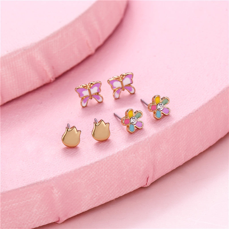 Aretes de tuerca de aleación con forma de corazón de dibujos animados para niñas con diseño floral esmaltado estilo dulce princesa