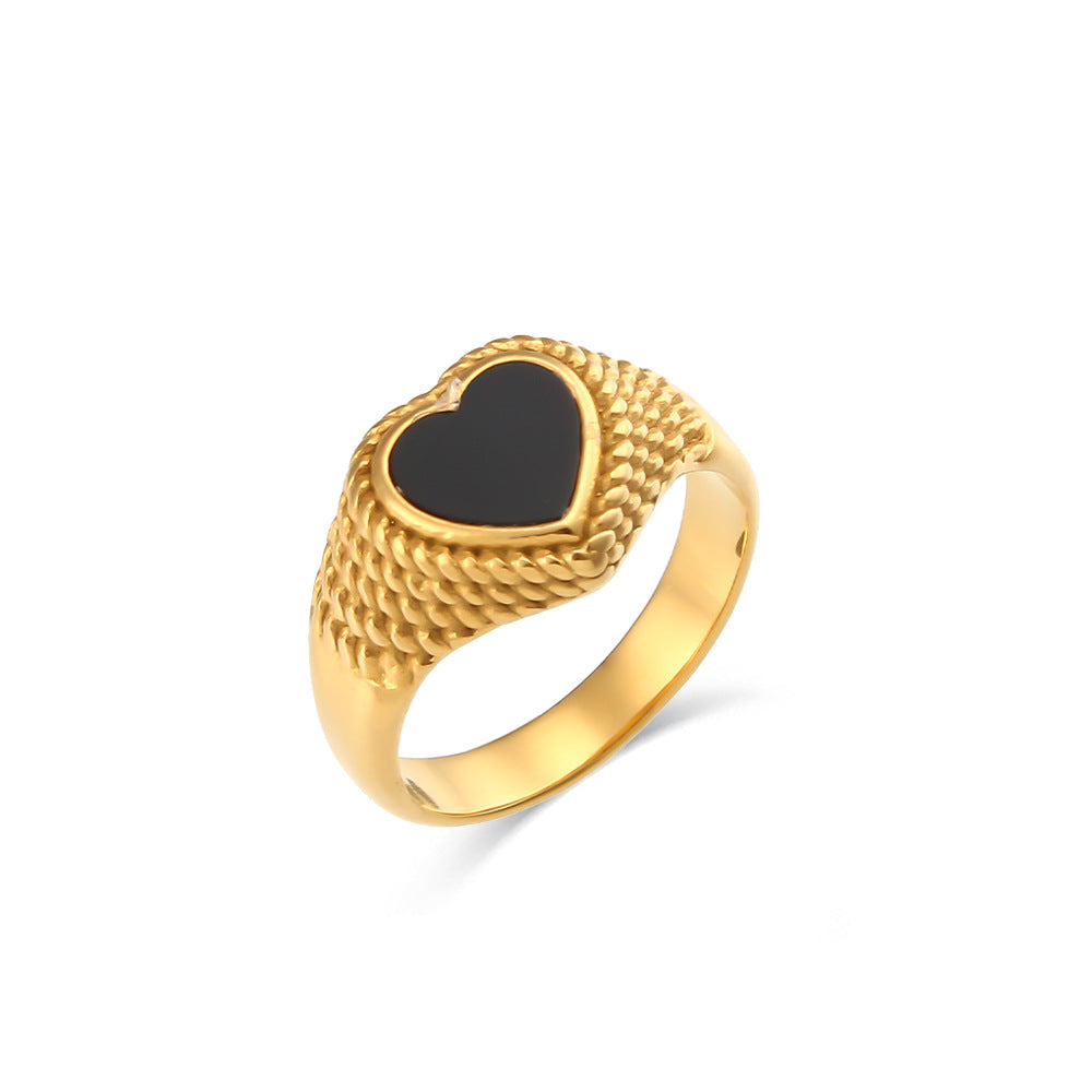 Anillo de acero inoxidable con forma de corazón estilo lujo, baño de oro de 18K y diseño trenzado.