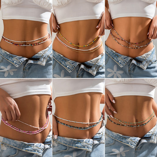 Catena in vita elastica minimalista con perline per donna con nappe in perline di riso miste