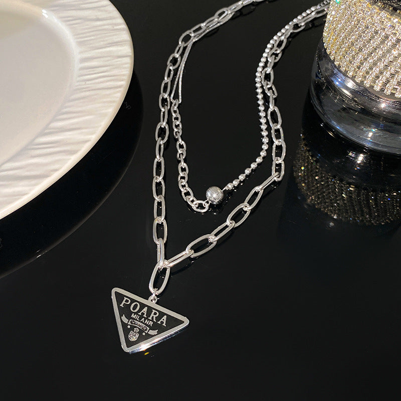 Geometric Gold Plated Titanium Steel Double Layer Necklace with Inverted Triangle Letter and Round Ball Pendant