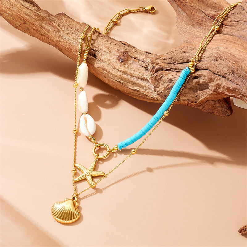 Collana a strati con ciondolo a stella marina e perla in acciaio inossidabile Fashion Office con charm a conchiglia e catena a scatola color oro