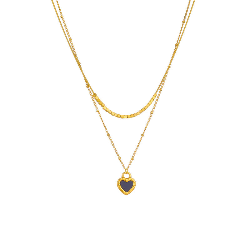 Minimalist Fashion Heart-Shaped Gold-Plated Titanium Steel Double-Layer Necklace with Black and White Heart Pendant