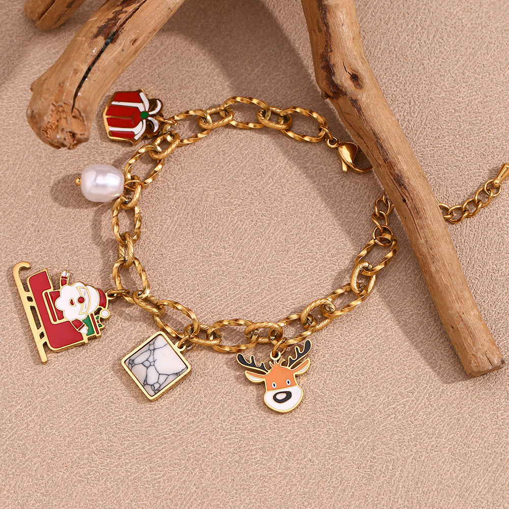 Simpatico bracciale da donna in acciaio inossidabile placcato oro 18 carati con Babbo Natale e renne in stile cartone animato