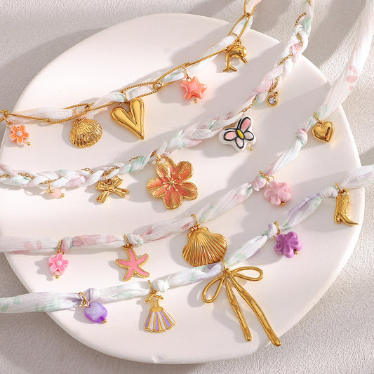 Fashionable Butterfly Bow Pendant Necklace for Women with Stainless Steel Chain Plated in 18K Gold Featuring Enamel Floral Heart and Shell Accents