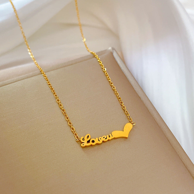 Collana pendente con lettera geometrica a cuore minimalista in acciaio al titanio per un look casual ed elegante unisex