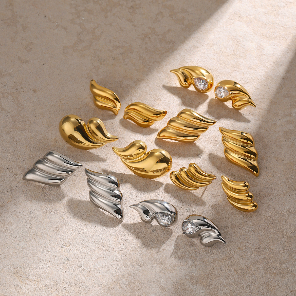 Vintage Minimalist Geometric Stainless Steel Stud Earrings with Polished Wing Design for Women