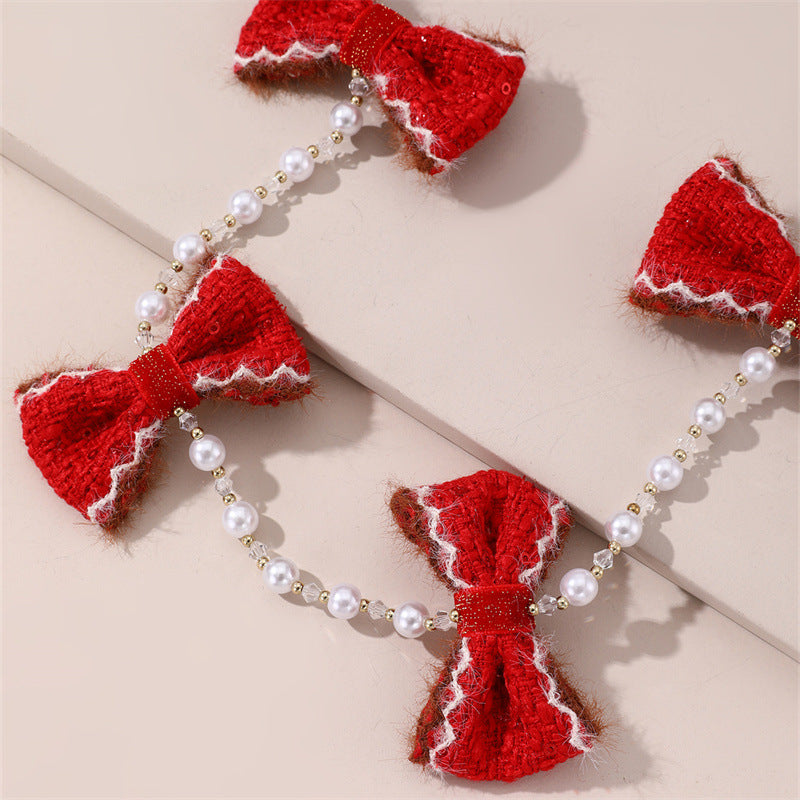 Lindo broche para el cabello en forma de lazo con adorno floral blanco, detalles de perlas y borlas para niñas