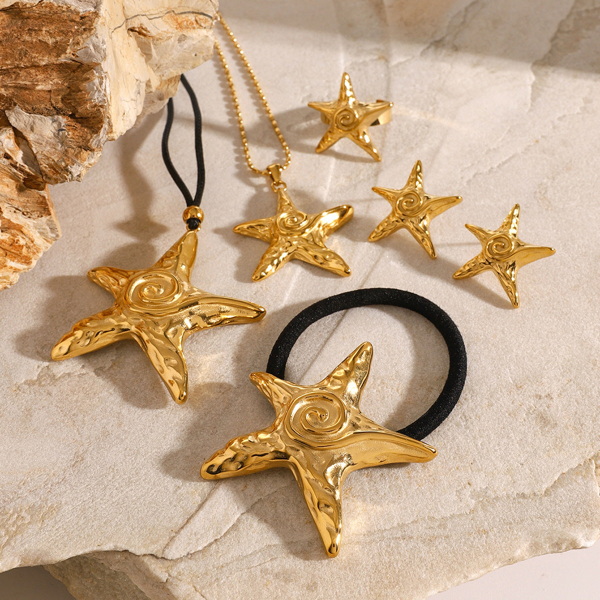 Elegante ferretto per capelli da donna a forma di stella marina in acciaio inossidabile con finitura placcata