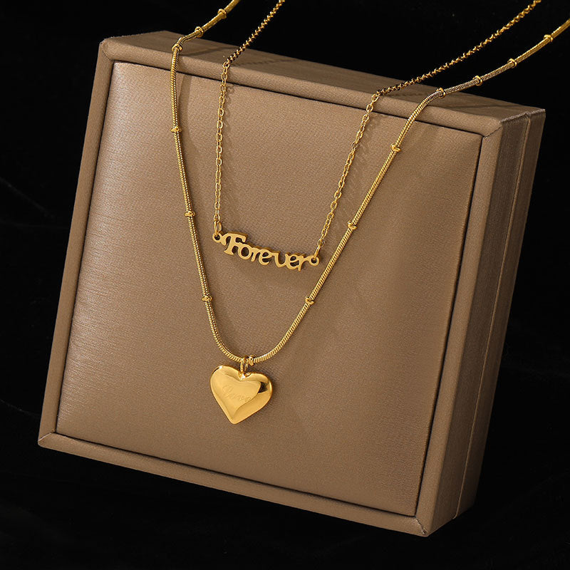 Collana Minimalista Geometrica in Acciaio Titanio con Intarsio in Oro da Donna, Stile Catenina a Croce, Accessorio di Tendenza Autunno Inverno