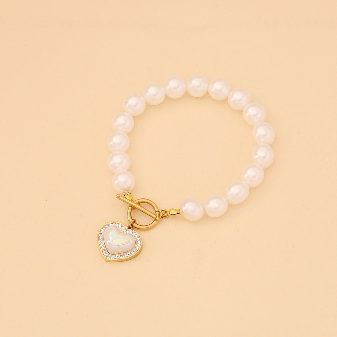 Collana alla moda in acciaio inossidabile a forma di cuore con perle simulate da donna
