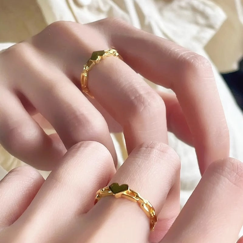 Sweet Minimalist Geometric Hollow Heart-Shaped Titanium Steel Ring with Gold Plating for Women