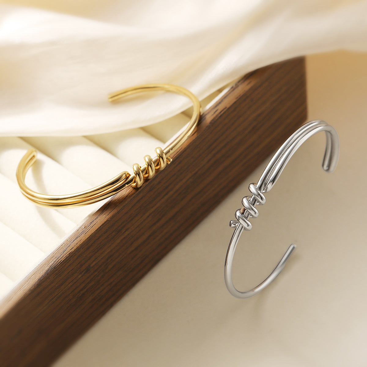 Minimalist C-Shaped Stainless Steel Bracelet for Women with 18K Gold Plating and Asymmetrical Knot Detail