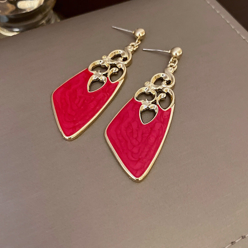 Orecchini a perno geometrici vintage in lega con intarsio di strass per donna