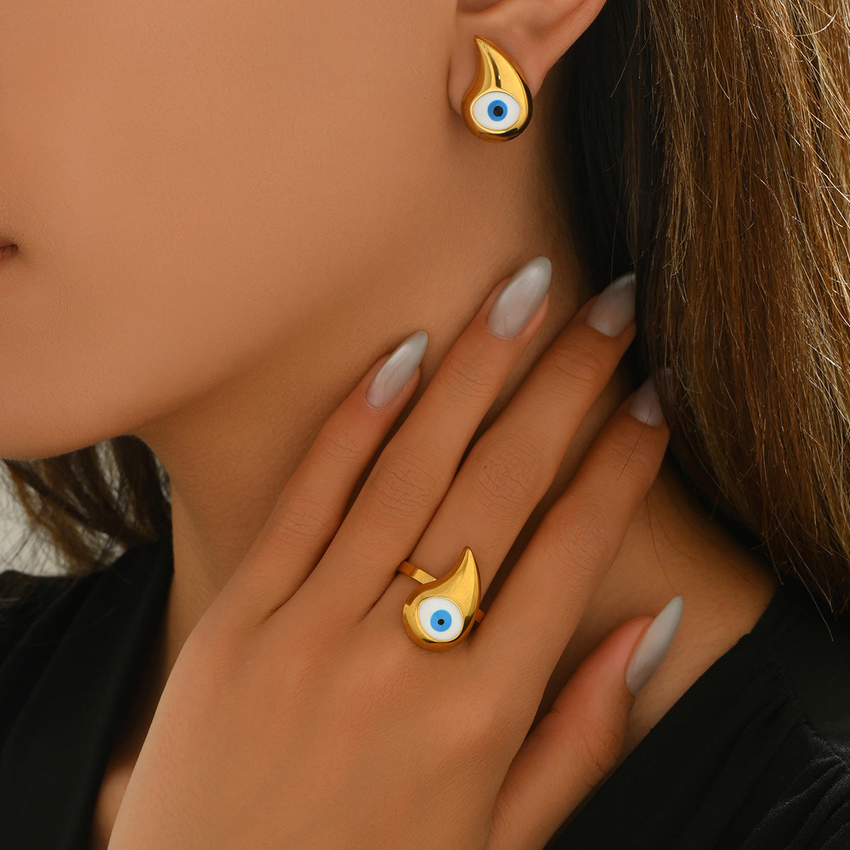 Elegante conjunto de anillo y pendientes de cobre esmaltado con forma de ojo para mujer