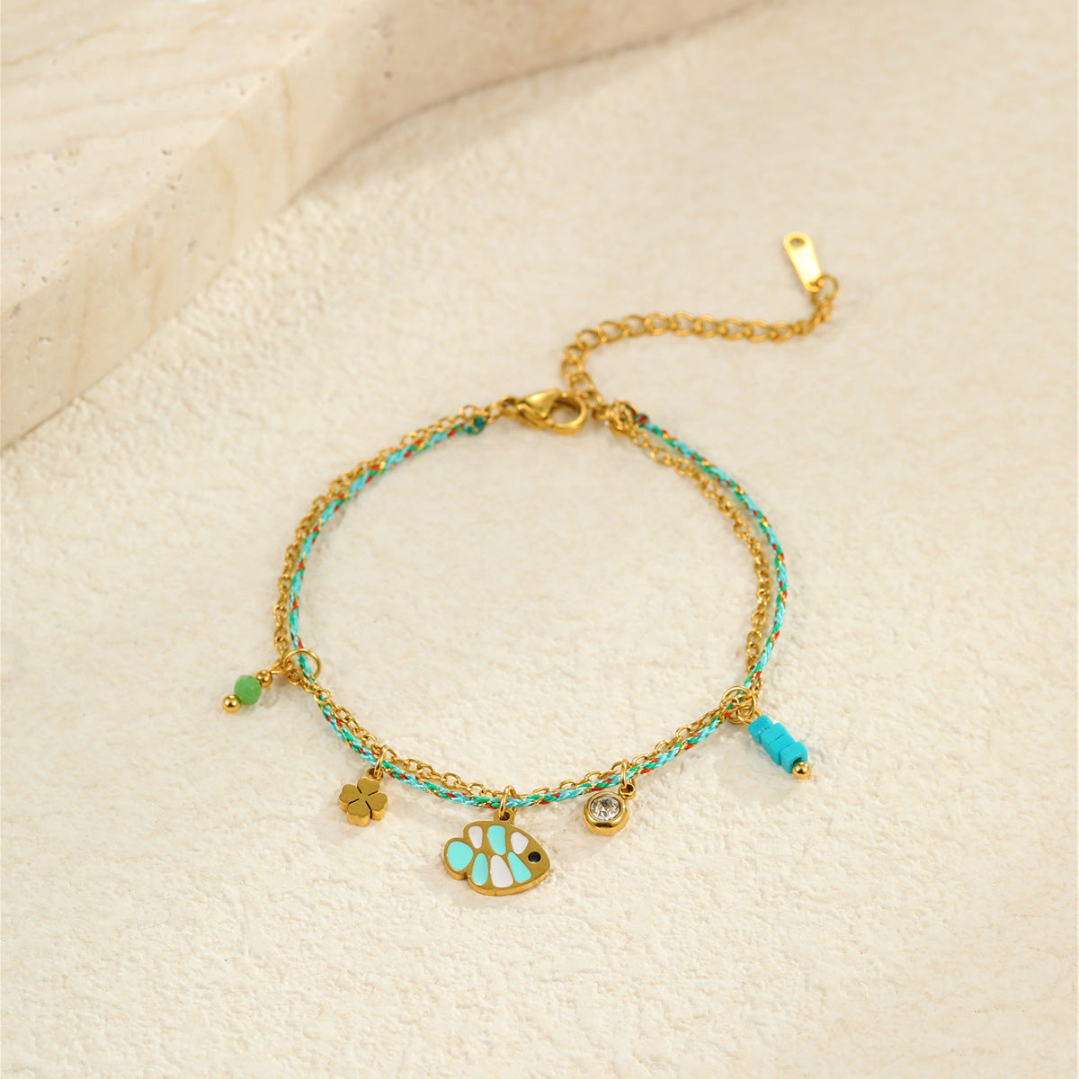 Fashionable Ocean-Inspired Braided Stainless Steel Bracelet with 18K Gold Plating and Zirconia Fish Pendant for Women