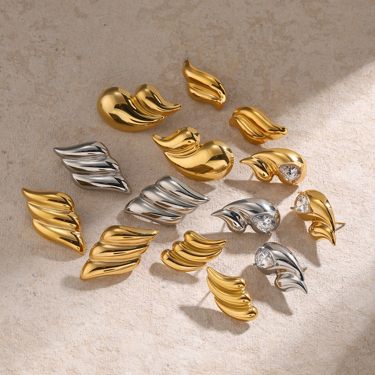 Vintage Minimalist Geometric Stainless Steel Stud Earrings with Polished Wing Design for Women