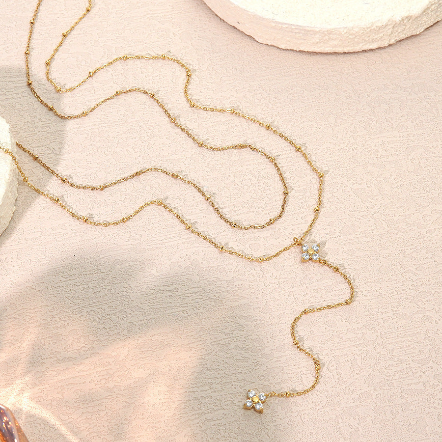 Collana a Nappa da Donna placcata in Acciaio Inox di Lusso con Zirconi Cubici e Motivo Floreale