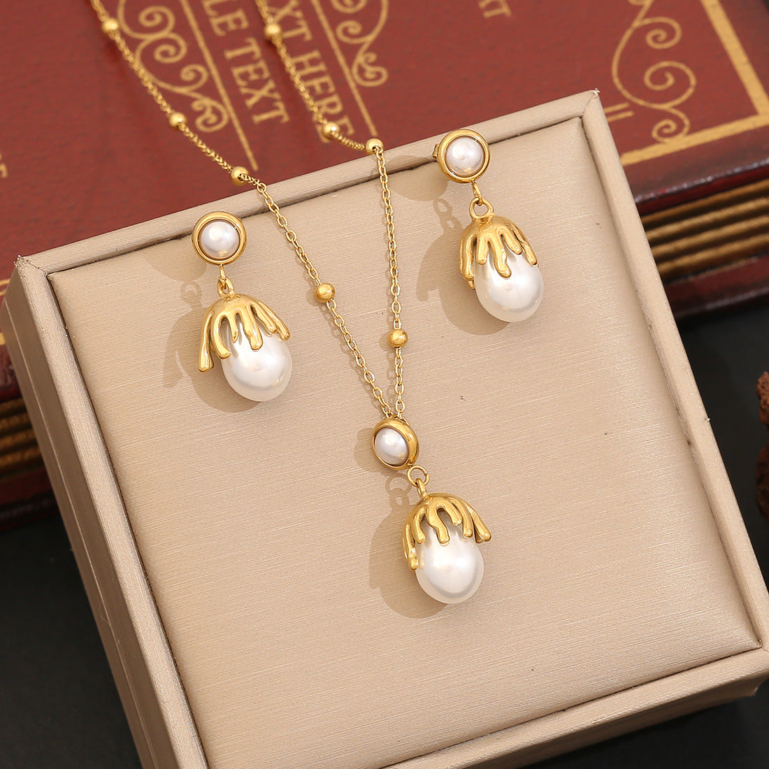 Set di Collana da Donna Elegante a Forma di Lampadina Irregolare con Perle Imitazione, Doppia Catena a O in Acciaio Inossidabile e Finitura Elettroplaccata