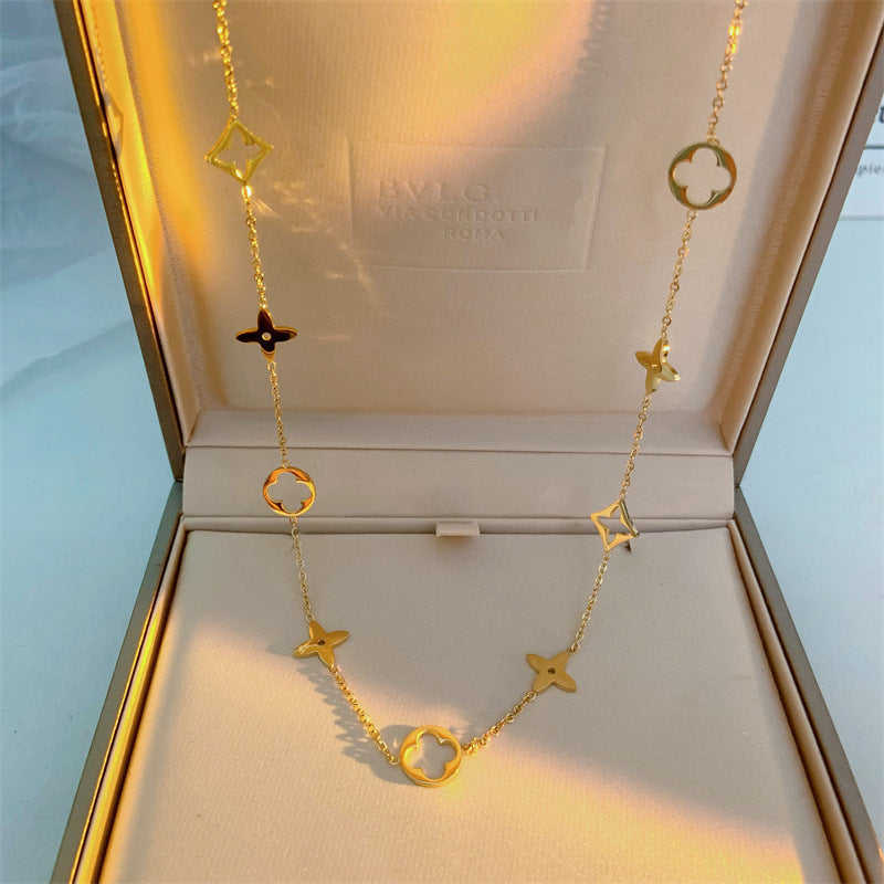 Collana minimalist in titanio a quadrifoglio da donna, con finitura galvanizzata e catena a O