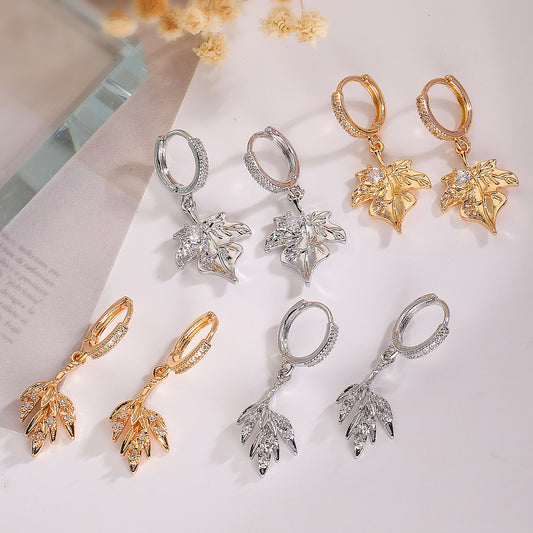 Pendientes colgantes minimalistas de hoja geométrica irregular para mujer con baño de oro e incrustaciones de circonitas