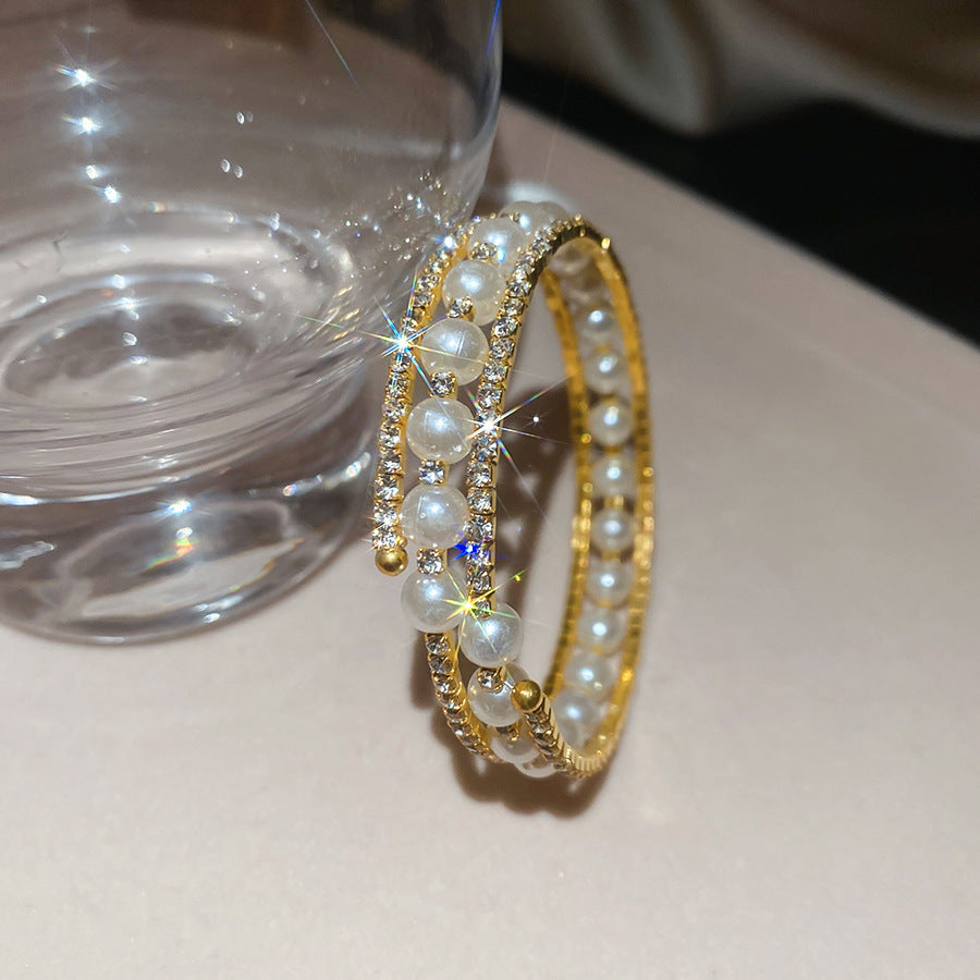 Elegante brazalete abierto de doble capa con perlas y diseño geométrico redondo, incrustaciones de pedrería y estilo vintage, accesorio minimalista de lujo
