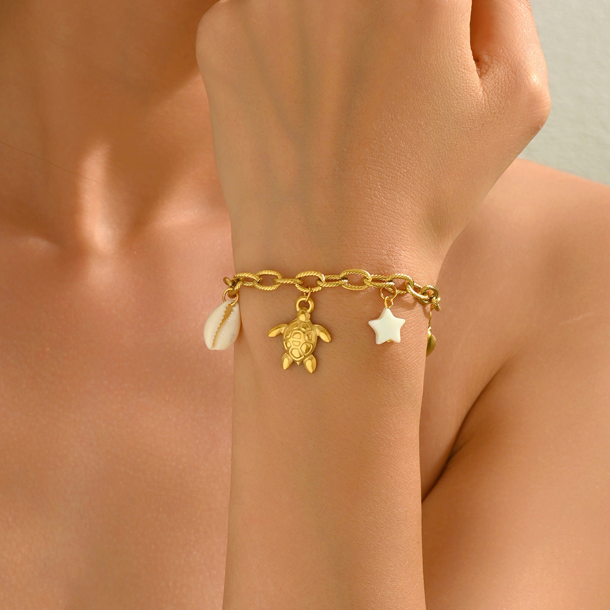 Ocean-Themed Women's Bracelet with Star and Turtle Shapes in Zinc Alloy with Plated Finish