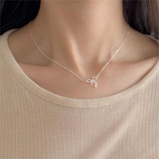 Minimalist Bowknot Shaped 925 Sterling Silver Necklace with Cubic Zirconia Accents on Cross Chain
