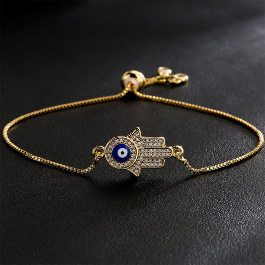 Exotic Geometric Evil Eye Hand Chain in Gold-Plated Copper with Micro-Pave Zirconia