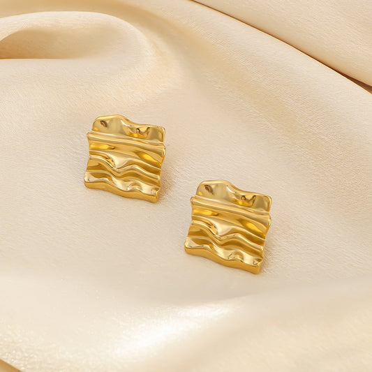 Aretes minimalistas geométricos de rombo de acero inoxidable con baño de oro de 18 quilates para mujer