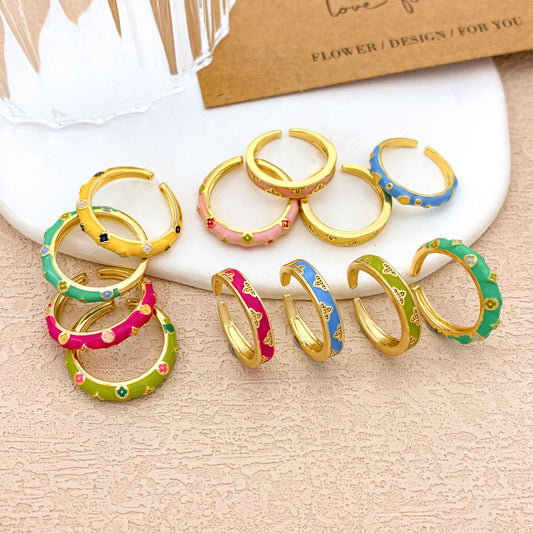 Anello da donna in lega a forma di fiore con smalto a goccia e placcatura in oro dolce