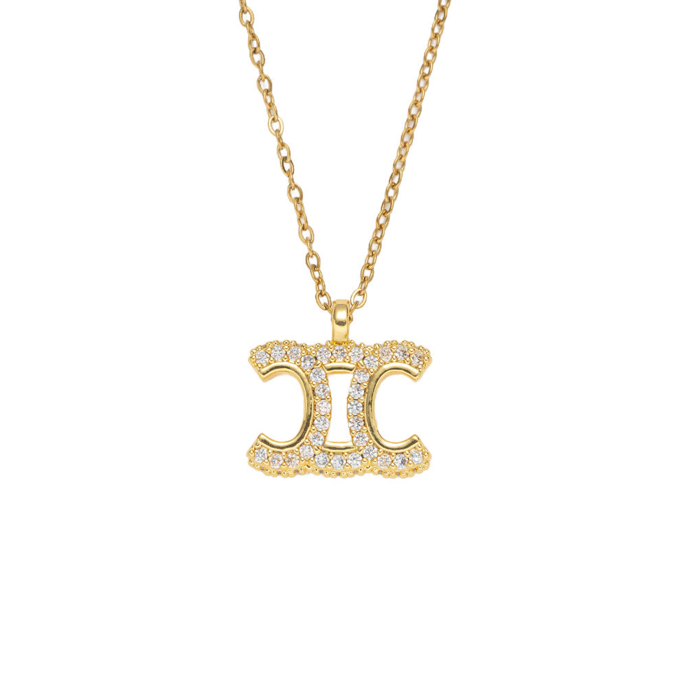 Luxury Minimalist Arc de Triomphe Pendant Necklace for Women in Titanium Steel with Gold Plating and Zircon Inlay