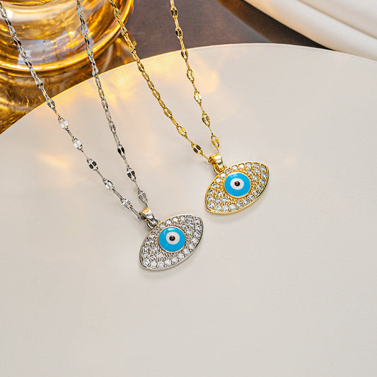 Collana con ciondolo a occhio di Allah stile INS in acciaio al titanio con finitura smaltata su catena ondulata da donna