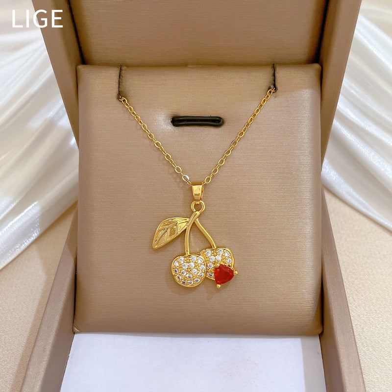 Collana con ciondolo a ciliegia stile cartone animato con strass per donna, catena in acciaio al titanio, design geometrico, stile minimalista a medaglione