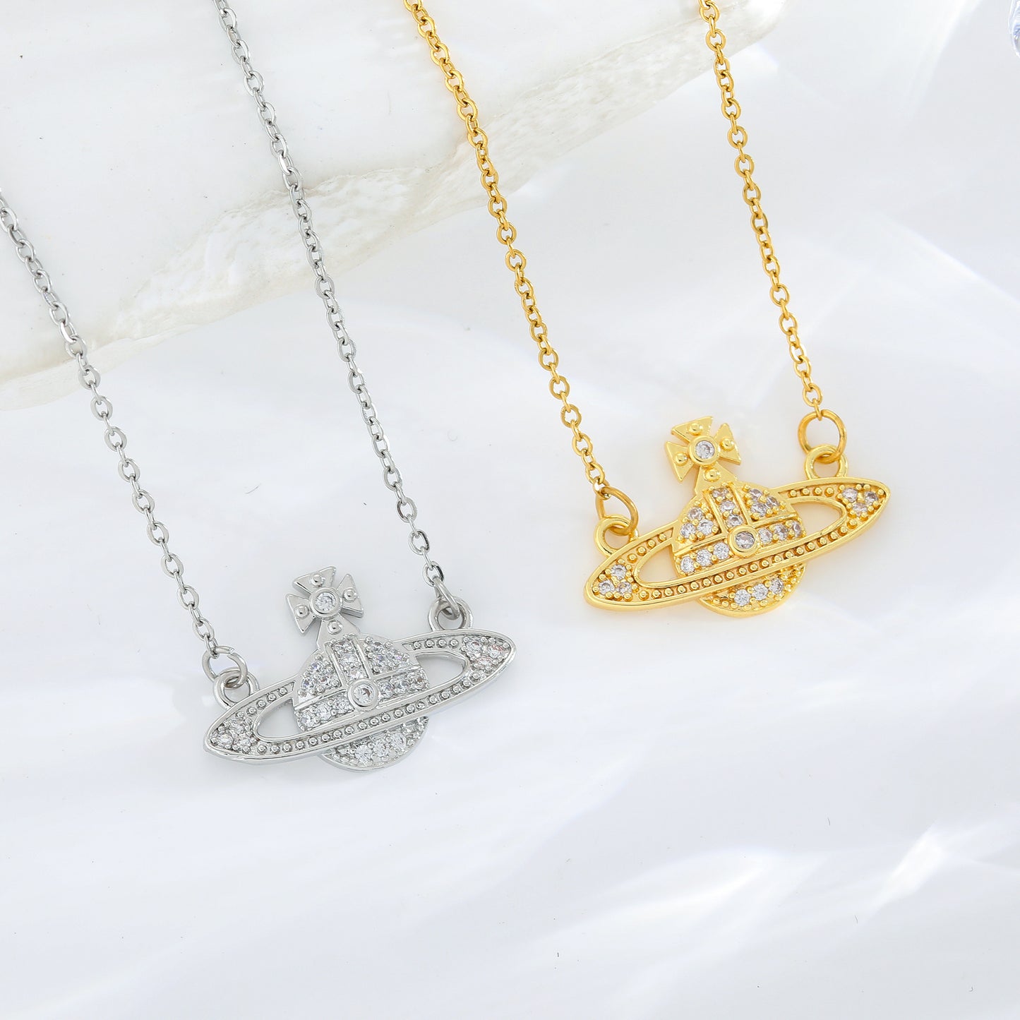 Fashion-Forward Geometric Saturn Pendant Necklace in Titanium Steel with Rhinestone Inlay and Electroplated Finish for Women