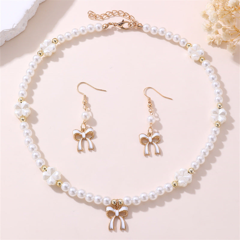 Set di Collana Minimalista per Bambine a Forma di Fiocco e Cuore in Resina con Finitura Placcata, per Età 3-10 Anni