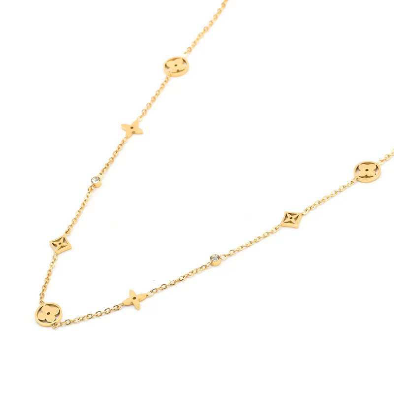 Minimalist Titanium Steel Hollow Four-Leaf Clover Necklace for Women with Electroplated Finish and Wavy Chain