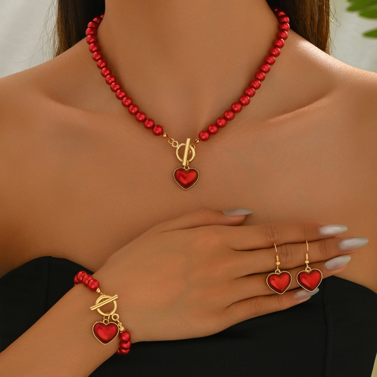 Conjunto de collar, pendientes y pulsera de aleación con perlas de corazón geométrico para mujer