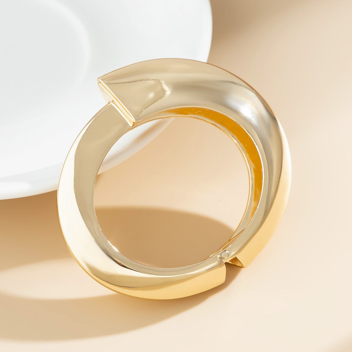 Bracciale in lega placcata a forma geometrica irregolare