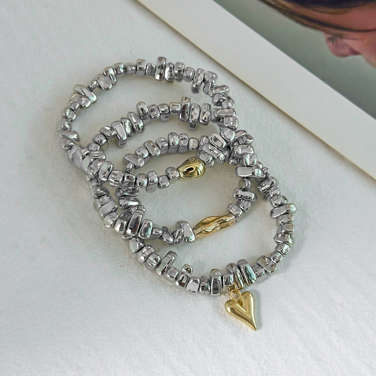 Bracciale da donna con perline a forma di cuore geometrico individualistico e nappine
