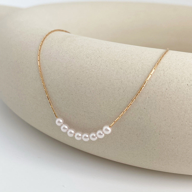 Minimalist Smile Pendant Titanium Steel Necklace with Eight Pearls for Women Short Clavicle Chain
