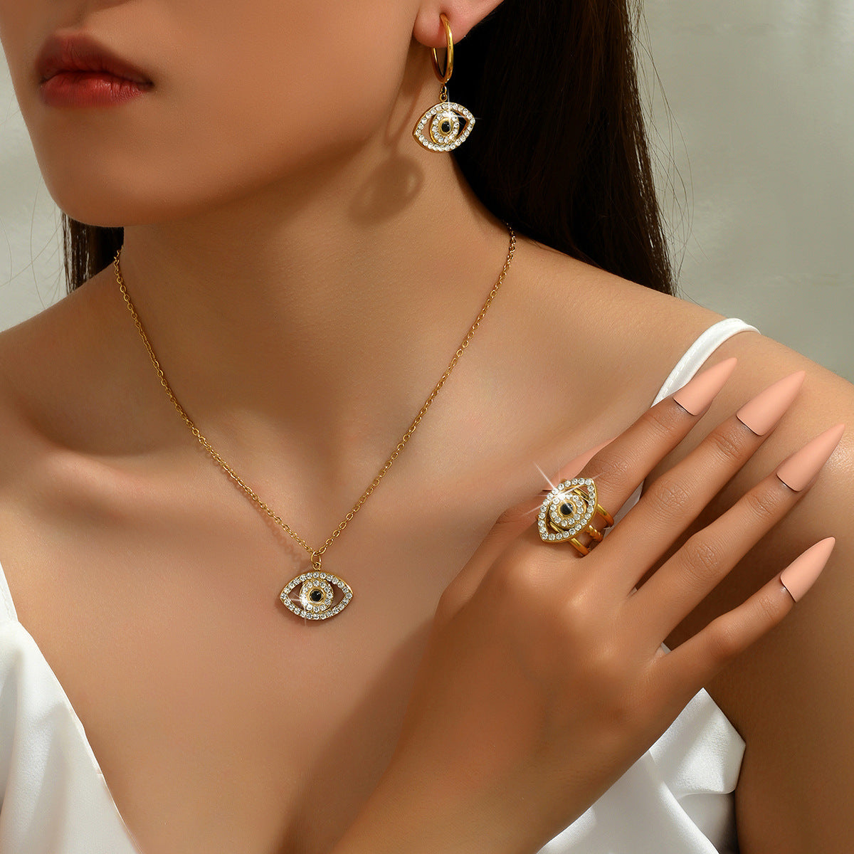 Fashionable Evil Eye Pendant Necklace Set with Zircon Inlay in Alloy for Women Including Earrings Ring and Bracelet