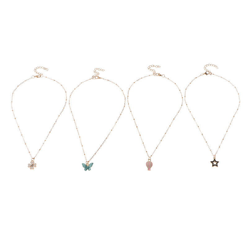Set Collana per Bambini con Ciondoli a Cartone Animato Farfalla Stella Quadrifoglio Mongolfiera in Lega Smalto con Catena a Scatola
