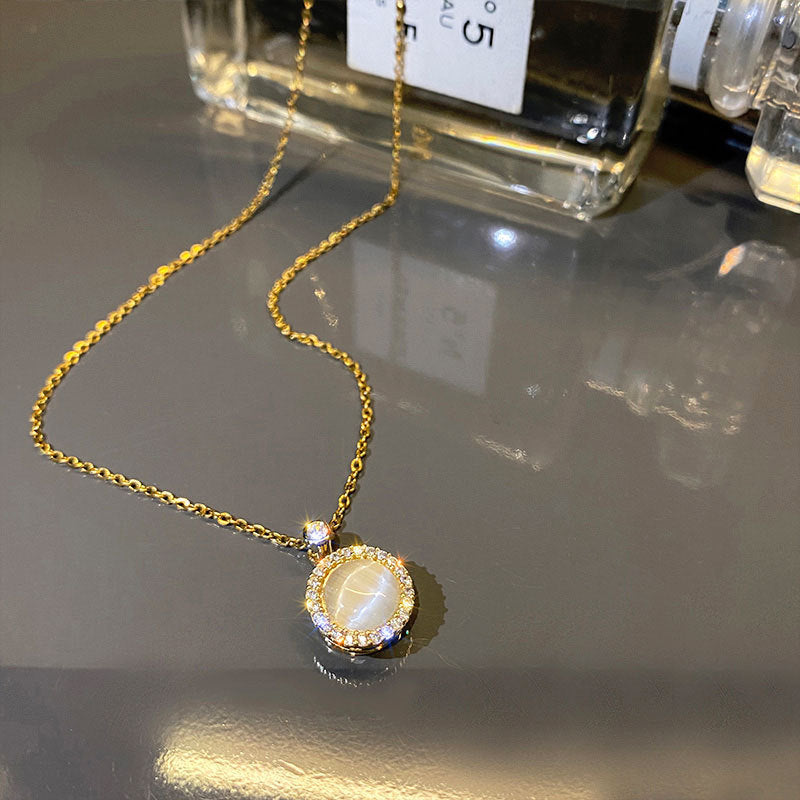 Collar con colgante de ojo de gato giratorio para mujer, circonita micropavé en cadena de serpiente de acero de titanio, diseño geométrico