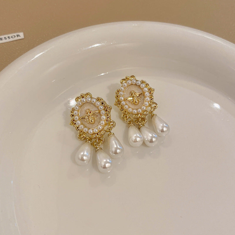 Pendientes de Ángel Retro Artísticos Ovalados con Incrustaciones de Pedrería para Mujer con Base de Cobre y Diseño Geométrico