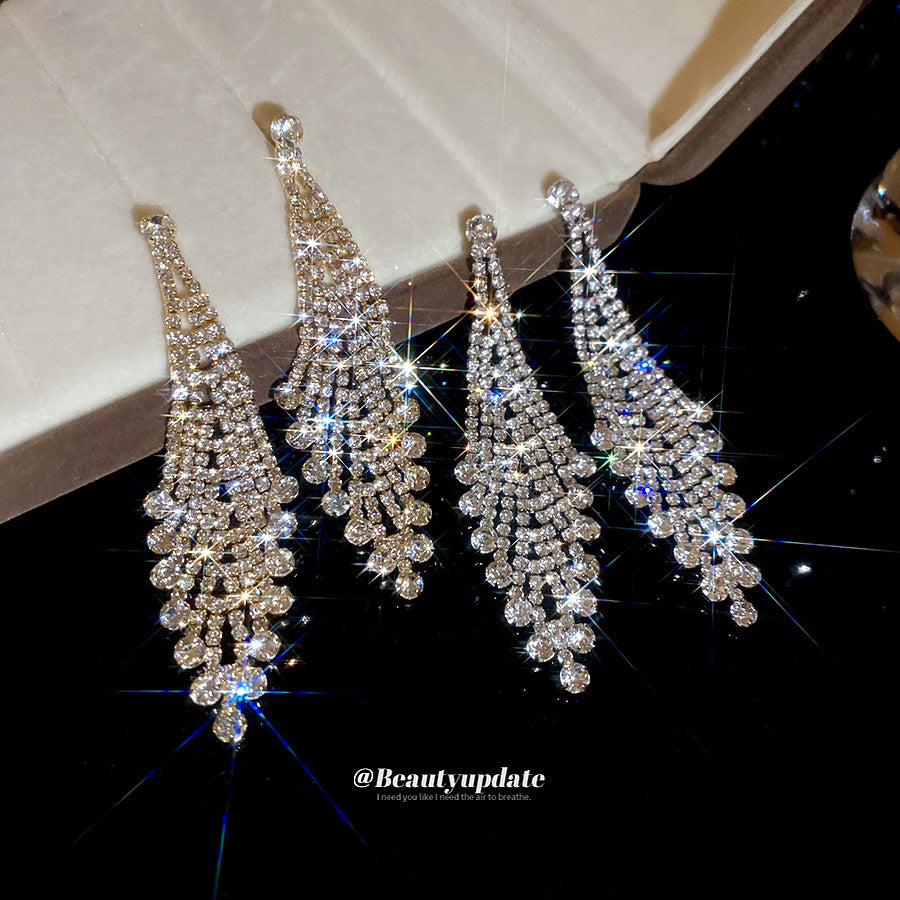 Orecchini pendenti da donna con nappine in stile europeo, intarsiati con strass e dalla forma geometrica